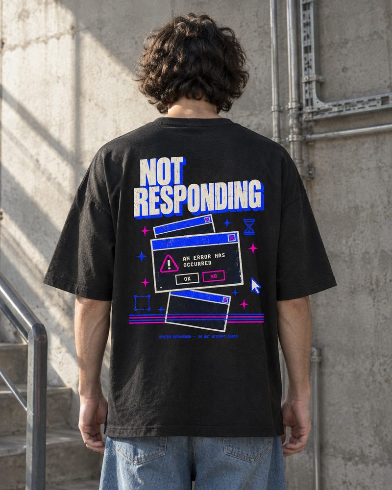 Not Responding tee, full back print of stacked error windows, standing by a concrete stairwell